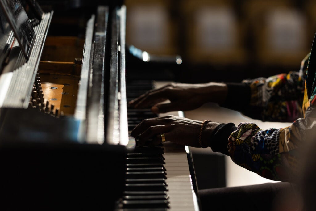 Carlos Simon's hands playing piano